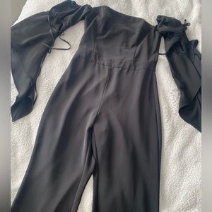 White House black market black long off the shoulder jump suit